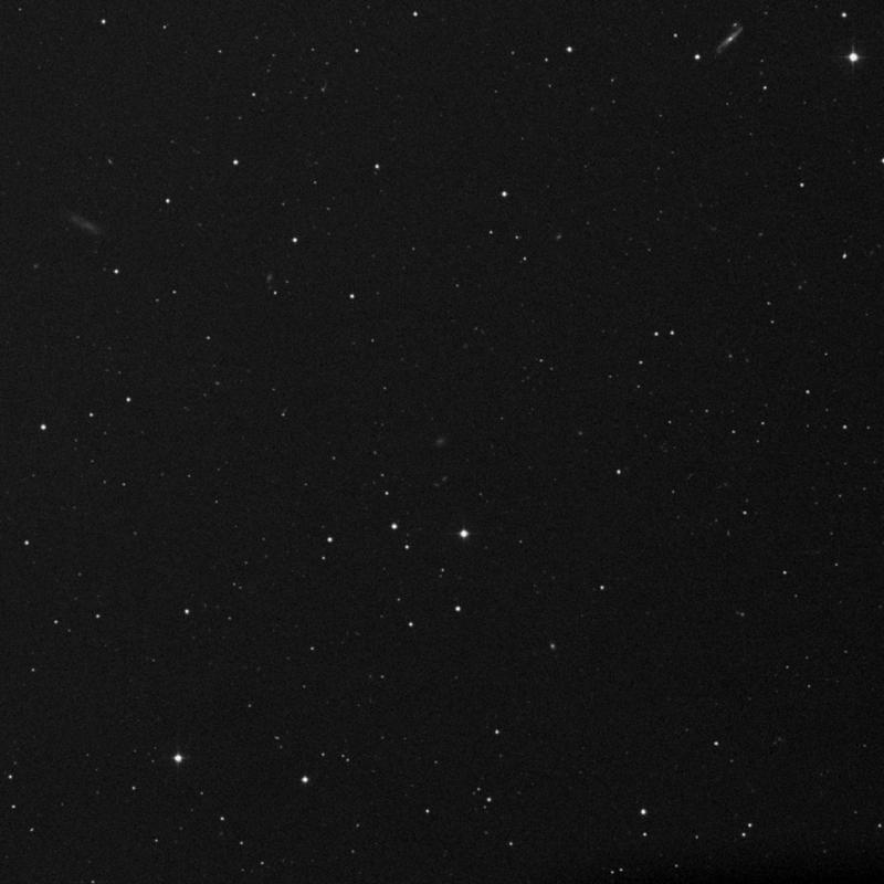 Image of IC 3052 - Irregular Galaxy in Virgo star