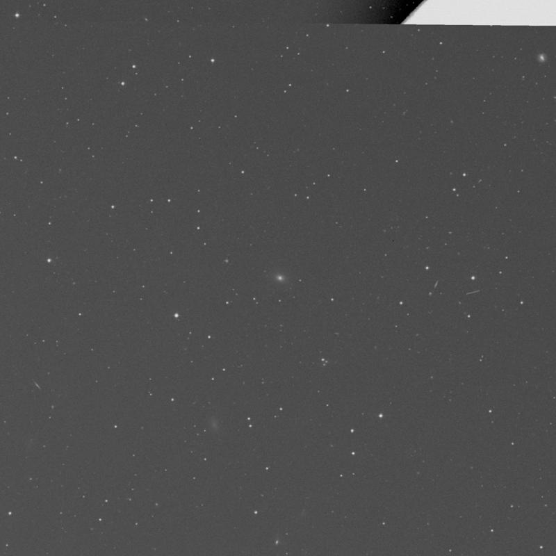 Image of IC 3509 - Elliptical Galaxy in Virgo star